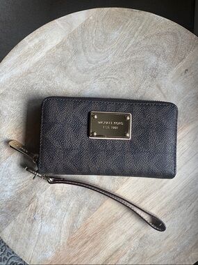 Michael Kors Dark Brown Small Leather Wristlet with Gold Plaque